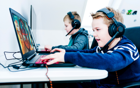 school age kids on computers