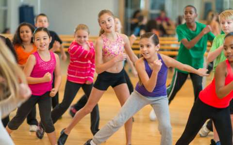 children exercising or dancing