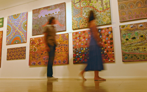 people looking at art in gallery