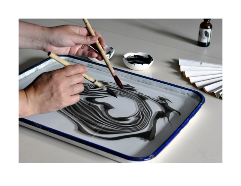 A person water marbling