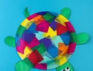 Picture of a turtle created with a paper plate with tissue papers on top decorating the shell