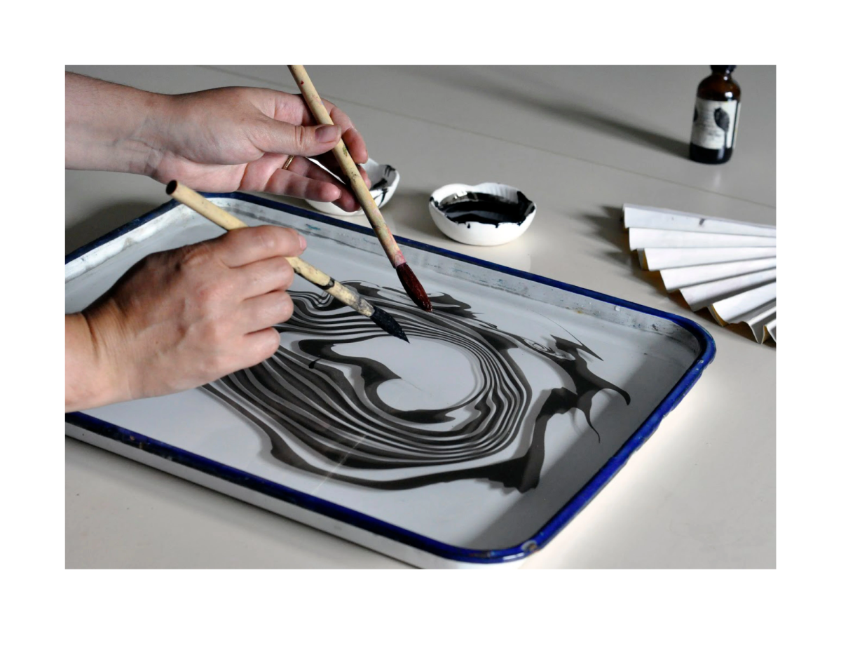 A person water marbling